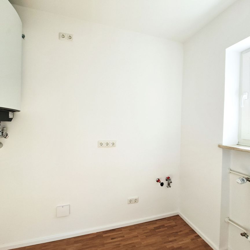 Charmante 2-Zimmer-Wohnung mit Westbalkon in Allach! - Foto 1