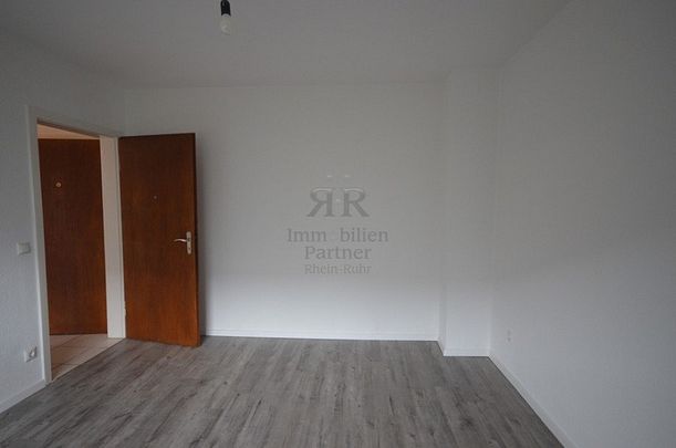 Schön renovierte und gemütliche Erdgeschosswohnung in ruhigem Haus mit neuem Bad! - Photo 1