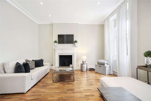 A beautiful second floor apartment in this period building in the heart of North Belgravia with the amenities of Motcomb Street just moments away. - Photo 1