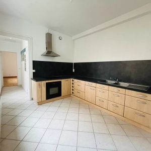 A LOUER APPARTEMENT EN RDC PROCHE CENTRE VILLE DE ST QUENTIN 02100 - Photo 2