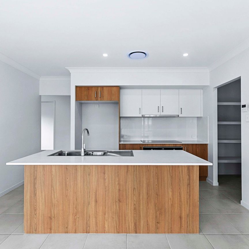BEAUTIFUL NEW HOME IN BURRUM HEADS - Photo 1
