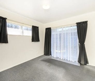 Charming 2BR Unit - Photo 3