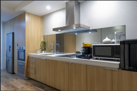 Stylish Inner-City Apartment with Resort-Style Facilities - Photo 5