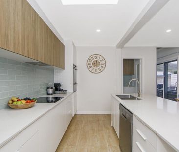 Coastal Luxury Meets Effortless Family Living - Photo 1