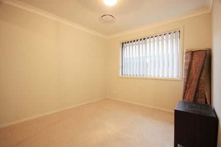 Stylish Family Home Offering Comfort, Space & Convenience - Photo 4