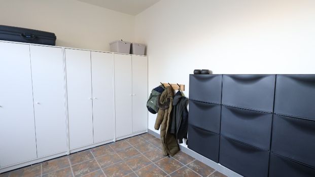 Gezellig tussenwoning met drie slaapkamers en tuin - Foto 1