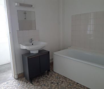 TYPE 2 18 RUE EUGENE SUE - Photo 4