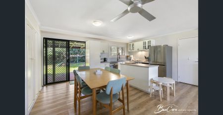 Lowset Home with Spacious Yard & Outdoor Entertaining - Photo 5