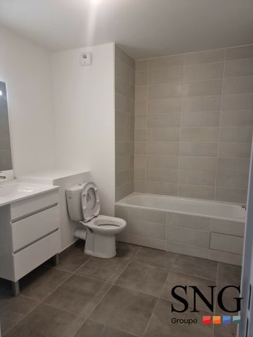 T2 NEUF AVEC TERRASSE ET JARDIN + PARKING - Photo 2