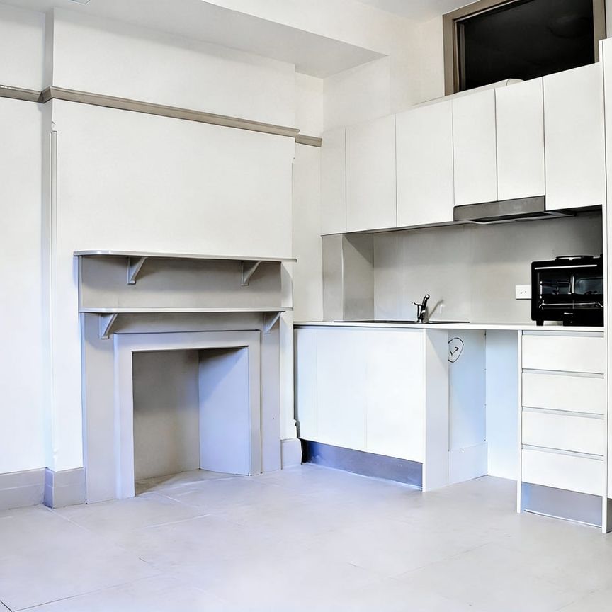 BRIGHT STUDIO LIVING WITH EXCEPTIONAL CONVENIENCE - Photo 1