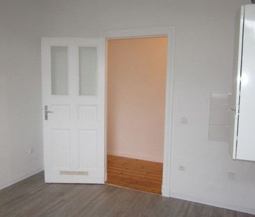 renovierte bzw. teilsanierte 2 Zimmer Wohnung mit Gemeinschaftsgarten in Erkner/bei Berlin - Foto 3