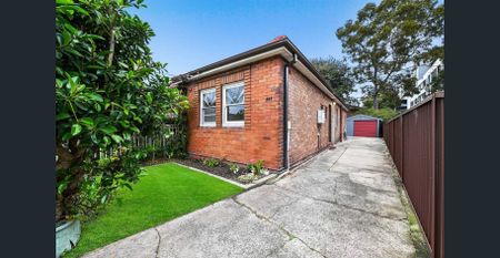 Contemporary 3-Bedroom Home with Garage - Photo 4