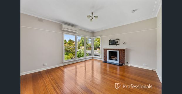 Charming Brick Home in prized location - Photo 1