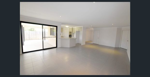 Spacious Family Home with Multiple Living Areas & Modern Comforts - Photo 1