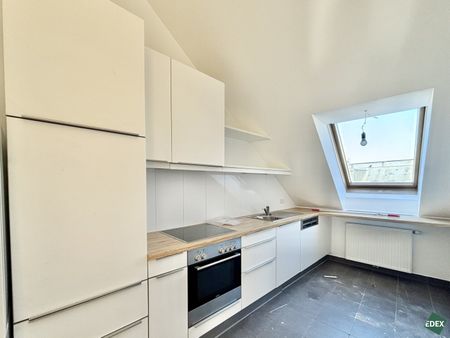 Charmante 2-Zimmer-Dachgeschosswohnung mit Süd-Terrasse und Kühlung nähe Arenbergpark - Photo 4
