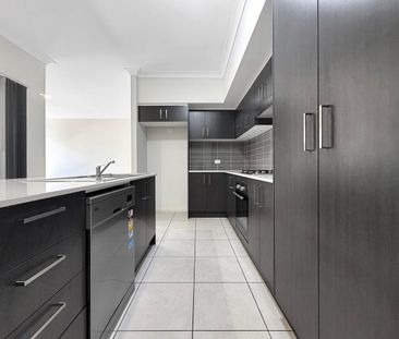 Charming 4-Bedroom Home in Prime Gregory Hills Location - Photo 6