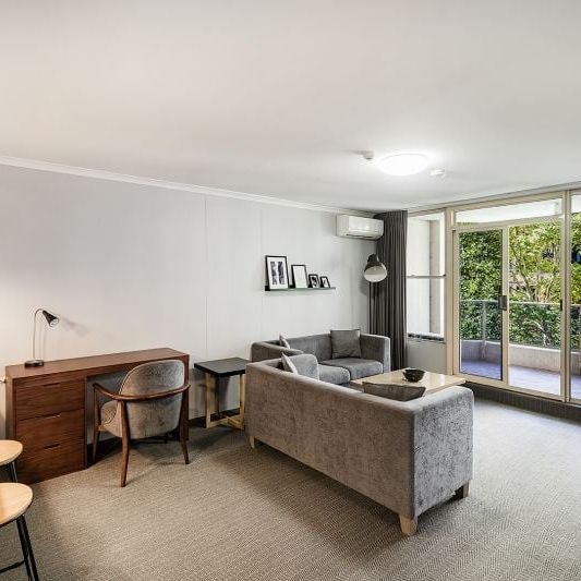 Large Updated Two Bedroom | Furnished - Photo 1