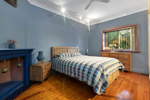 Charming full brick family oasis with two street access - Bordering Belmore - Photo 1