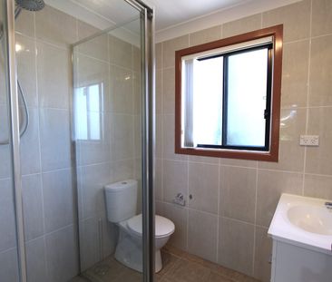 Lovely family home with additional sleep out! Great location with b... - Photo 2