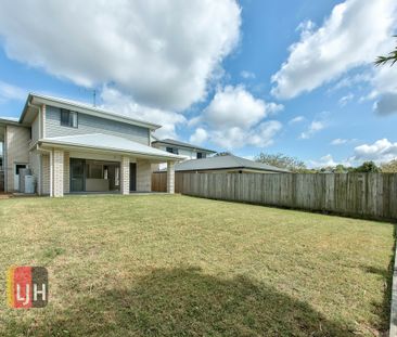SPACIOUS AND AIR CONDITIONED 4 BEDROOM HOME - Photo 1