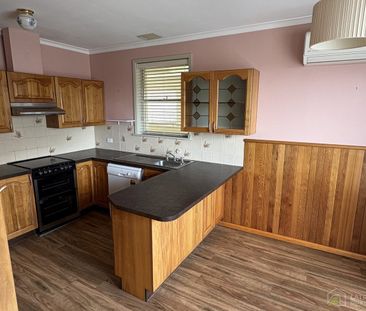 Solid 3‑Bedroom Brick Home with a large shed - Photo 6