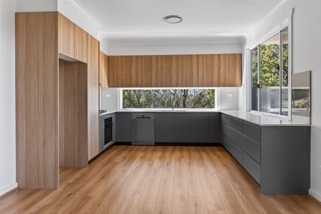 Stylish 3-Bedroom Unit with Escarpment Views & Modern Updates - Photo 3