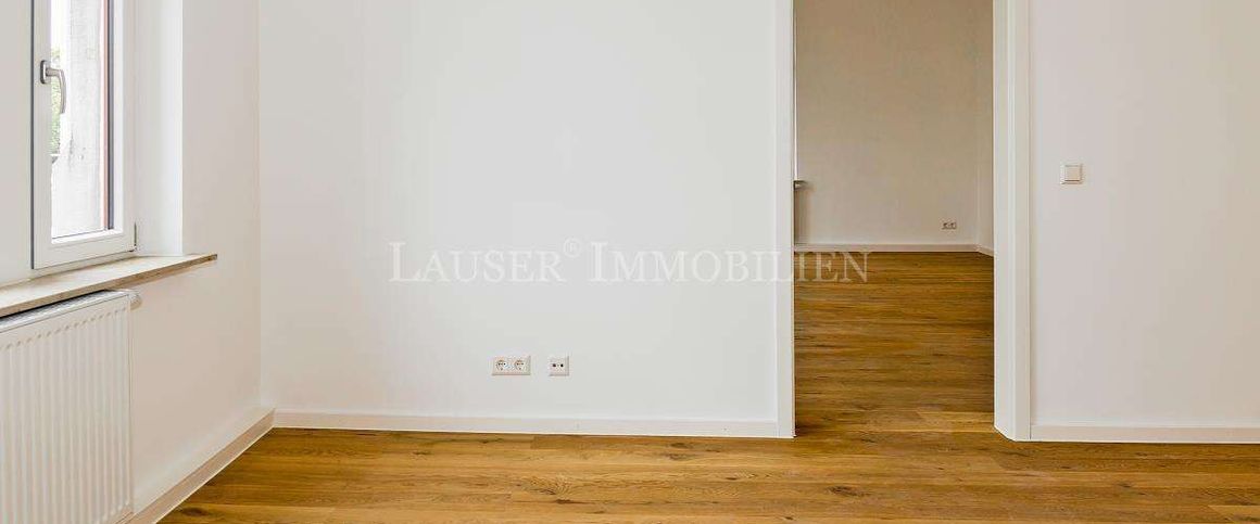Attraktive Drei-Zimmer-Altbauwohnung mit Balkon in kernsaniertem Haus - Foto 1