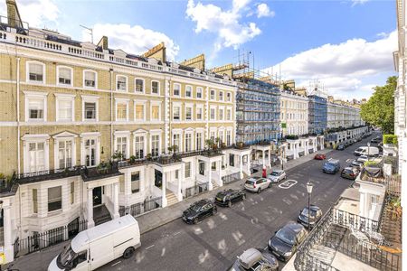 A brilliant studio flat in a prime South Kensington location with shared bathroom facilities. - Photo 5