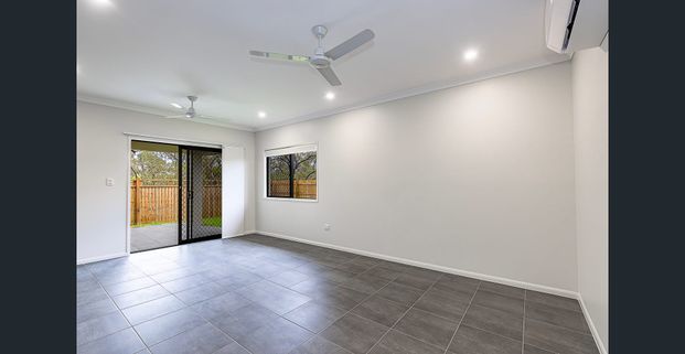 Modern Family Living Starts Here: Brand New Four-Bedroom Build! - Photo 1