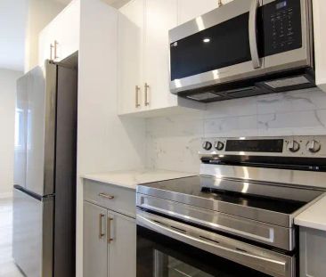 East Pine Apartments — Townhome - The Brownstone - Photo 1