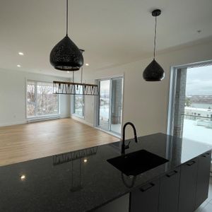 magnifique 5 1/2 neuf vue sur le fleuve - Photo 2