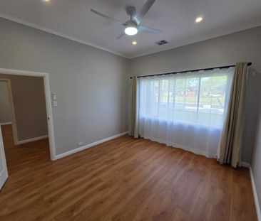 Luxuriously renovated home with landscaped gardens & security system - Photo 6