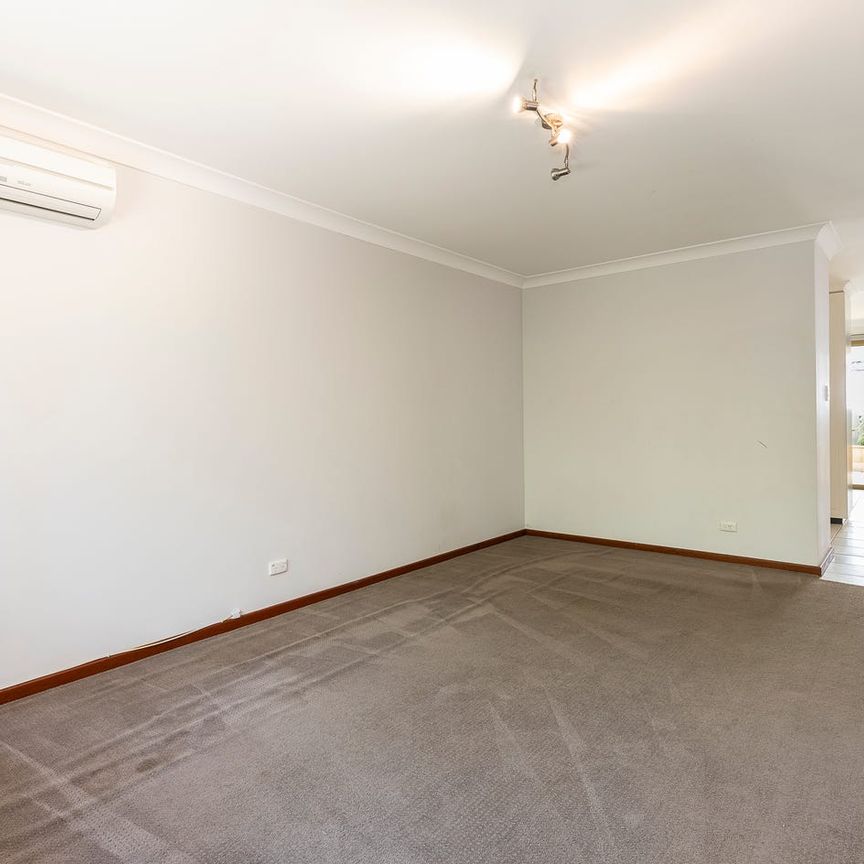 Spacious Two-Bedroom Unit with Large Backyard - Photo 1