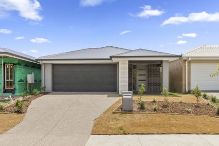 Modern Family Home with Fenced Backyard - Photo 5