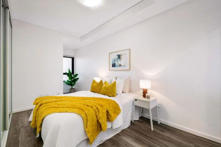 Modern two-bedroom plus study apartment framed by Harbour Bridge views - Photo 3