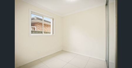 Beautiful Three Bedroom Granny including water in a Highly Sought-After Location! - Photo 4