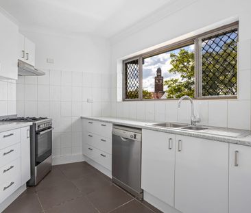 Renovated Split-Level Apartment with Tandem Garage *Water bills inc... - Photo 6