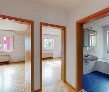 Charmante 3-Zimmer-Hochparterrewohnung mit Balkon, Garage und Garte... - Foto 1