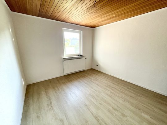 Großzügige Erdgeschosswohnung im Herzen von Wiefelstede! - Photo 1