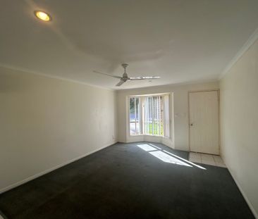 SPACIOUS SOUTH GLADSTONE UNIT IN QUIET LOCATION - Photo 2