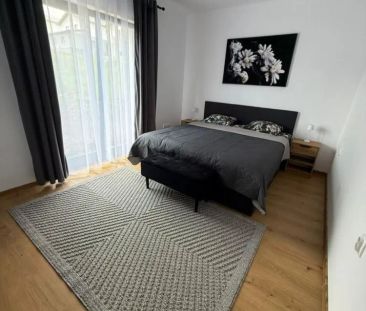 Casa 4 camere,2bai, 700 mp teren,mobilată si utilată - Photo 2