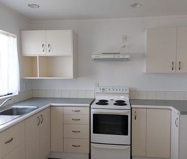 Charming 2BR Home with Modern Comforts - Photo 1