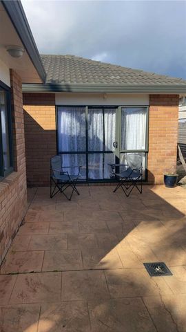 WELL PRESENTED BRICK AND TILE HOME - Photo 2