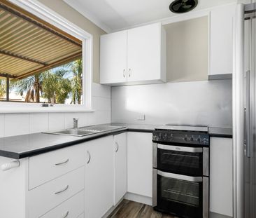 Don't miss this 3x1 well located with a large Backyard. - Photo 1