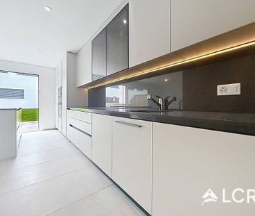 Magnifique appartement de 5.5P / 4 CHB / 2 SDB / 1 balcon / 1 Jardin /2 places de parc - Foto 4