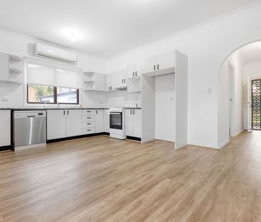 Refurbished Family Home with Huge Rear Yard - Photo 1