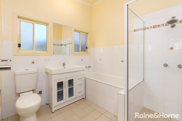 HOME IN THE HEART OF CARRINGTON INCLUDING LAWN MAINTENANCE - Photo 1