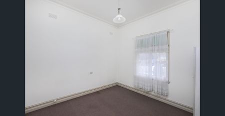 CHARMING THREE-BEDROOM HOME! - Photo 5