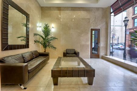 Condo lumineux et élégant dans l’immeuble patrimonial Thémis, au cœur du Vieux-Montréal. - Photo 4