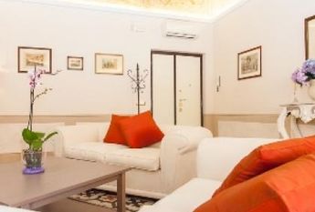 Center-Historic Jewish Quarter: Elegant apartment situated in beautiful Palazzo Nobiliare. Entrance, spacious living with original wood frescoed ceilings, large modern dining and kitchen, 4 bedrooms, 4 Baths, small terrace. #1527